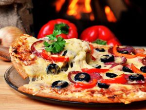 Pizzas Artisanales Gourmandes cuites au Feu de Bois